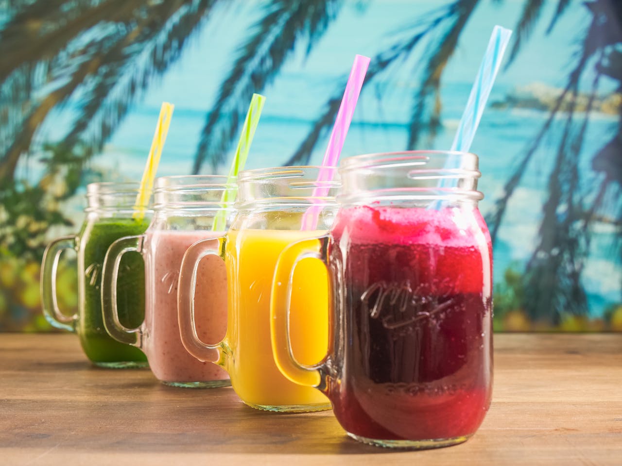 Crafting Captivating Headlines: Your awesome post title goes here Vibrant fruit juices in mason jars with colorful straws, perfect for a summer refreshment.
